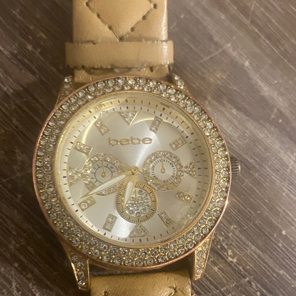 Bebe Gold-Tone Watch with Tan Strap and Crystal Details
